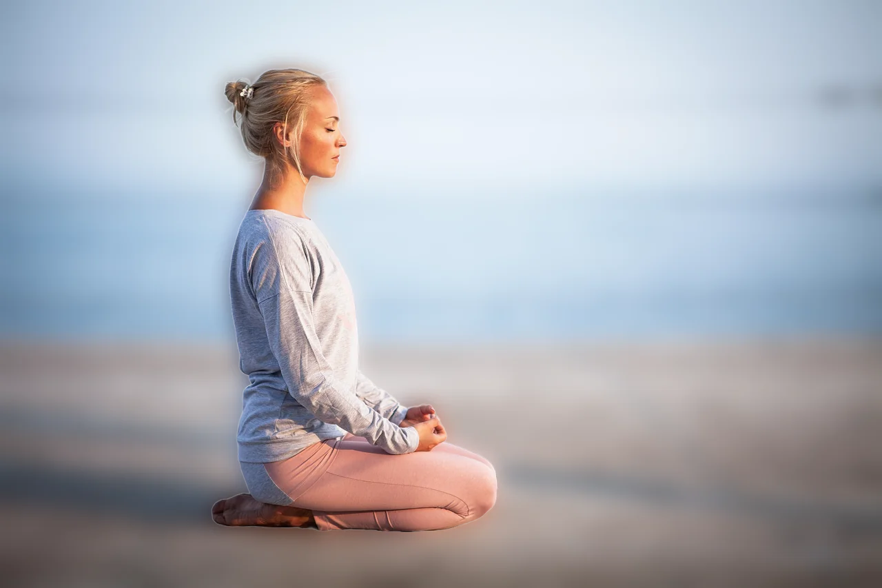 Marketing image of a sharply focused person with a softened beach background